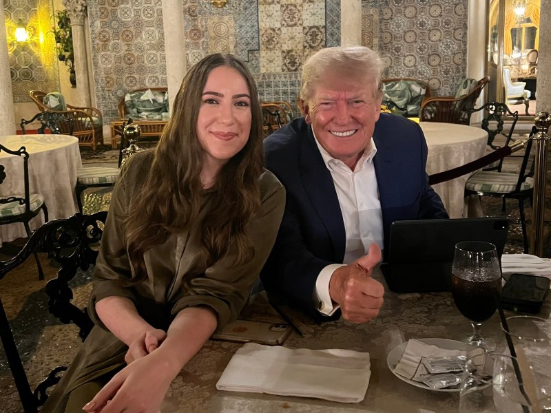 Chaya Raichik, creator behind the X account Libs of TikTok poses with Donald Trump.